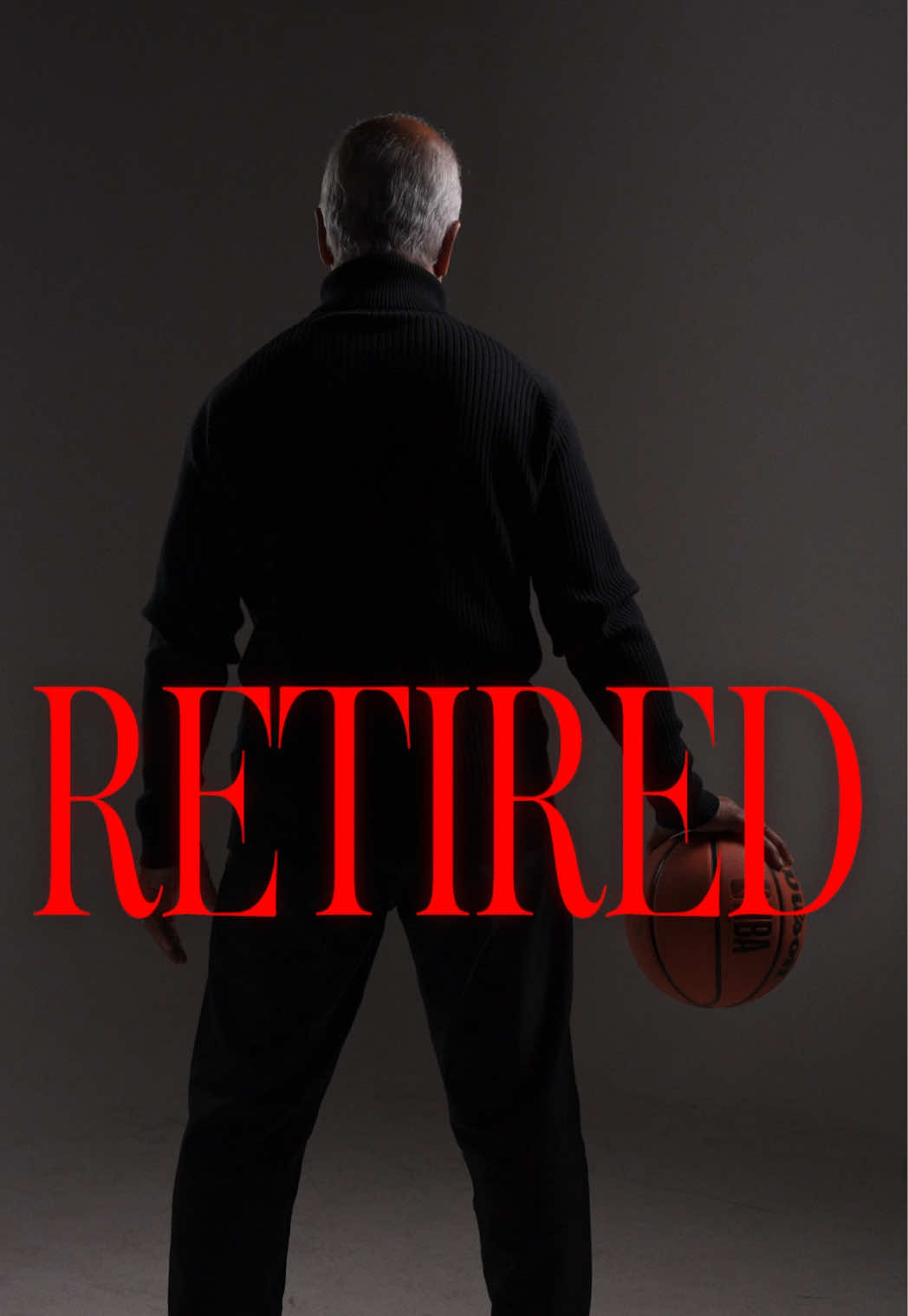 Kumar from behind holding a basketball under a giant red RETIRED title card
