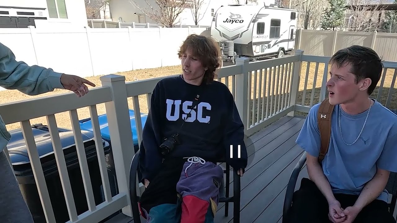 Ben Schneider being questioned on a porch during the Utah campaign